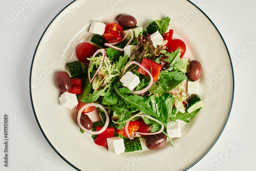 Wallpaper Mural top view photo of plate with freshly made tasty Greek salad on grey background, healthy eating Torontodigital.ca