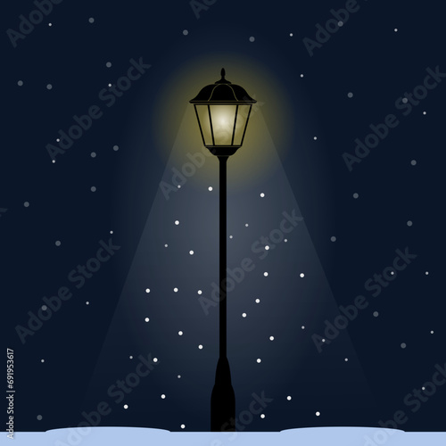 street lamp illuminating the snowfall