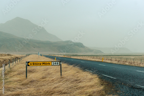 Stóra mork sign in Iceland road with mointains in autum photo