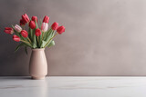 A vase with tulips with space for text