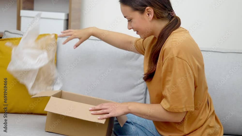 shopaholic woman embraces her fashion parcel, affirming happiness from e-commerce and rapid express online shopping. shopaholic woman embraces her fashion parcel, affirming happiness from e-commerce and rapid express online shopping.
