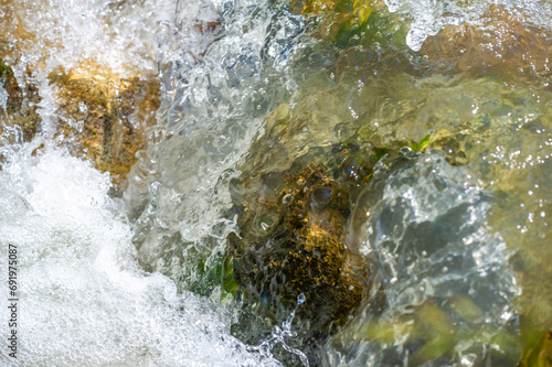 Experience the calming energy of a sparkling mountain stream. Find inner peace in the soothing rhythm of flowing water. Immerse yourself in the beauty and tranquility of nature.