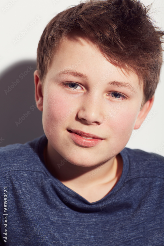 Teenager, thinking and face of boy in studio, white background or dream of future with vision. Kid, relax and wonder with inspiration or confident child with a smile and insight in mock up space Teenager, thinking and face of boy in studio, white background or dream of future with vision. Kid, relax and wonder with inspiration or confident child with a smile and insight in mock up space