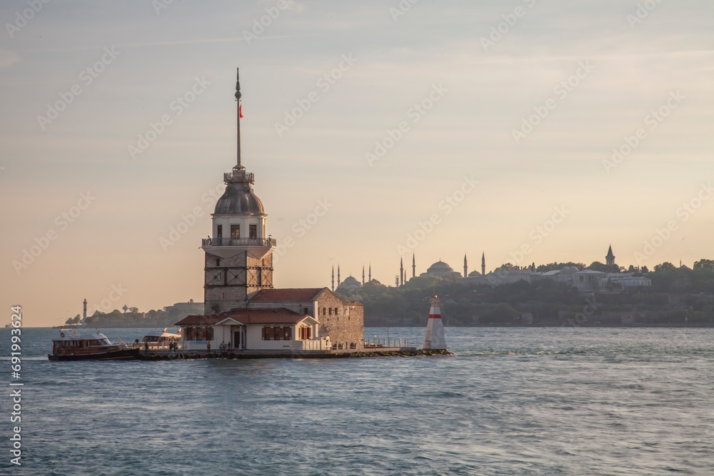 Fototapeta premium Maiden's Tower one of the touristic points of Istanbul city and photographs taken at sunset and blue hours
