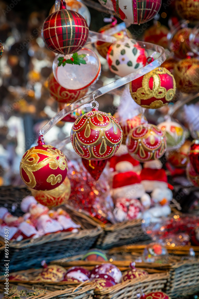 Christmas baubles on a stall, with a shallow depth of field