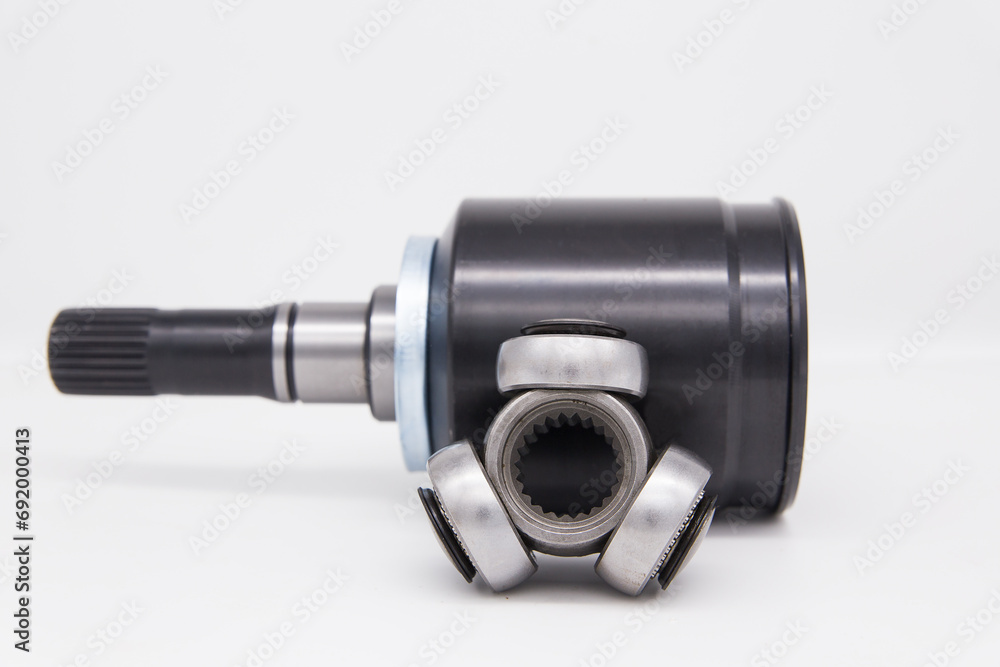Constant velocity joint on a white background. The tripoid is the basis of the hinge.