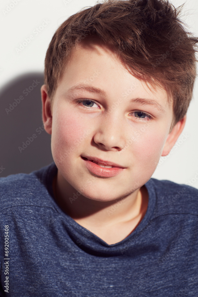 Teen, thinking and face of boy in studio or white background with a dream of future and vision. Kid, relax and wonder with inspiration or confident child with a smile and insight in mock up space Teen, thinking and face of boy in studio or white background with a dream of future and vision. Kid, relax and wonder with inspiration or confident child with a smile and insight in mock up space