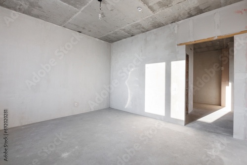 interior of the apartment without decoration in gray colors. rough finish