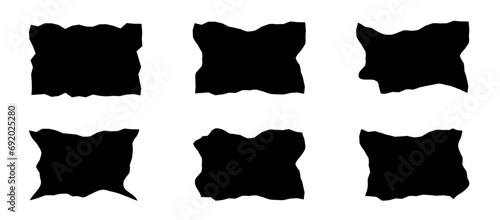 Silhouette of torn paper. Shadow of a crumpled rectangle. Black abstract shapes with jagged edges