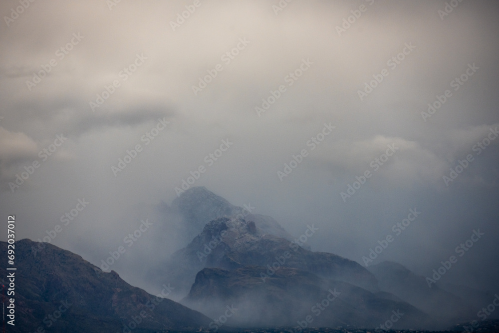 Rincon Mountains Shrouded In Thick Clouds Over Tuscon