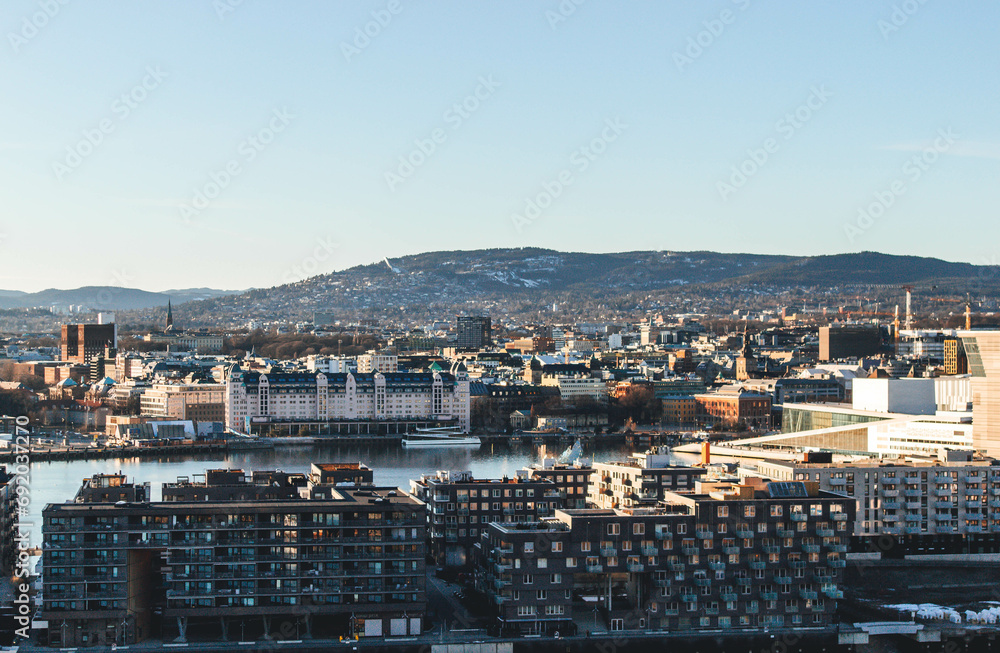 panorama view of oslo city in spring during unfrosting with sunset light
