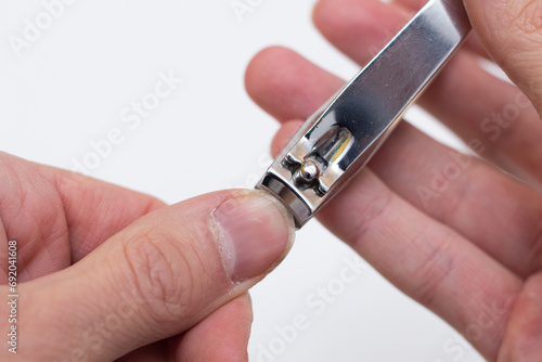 Man cutting his nails close up