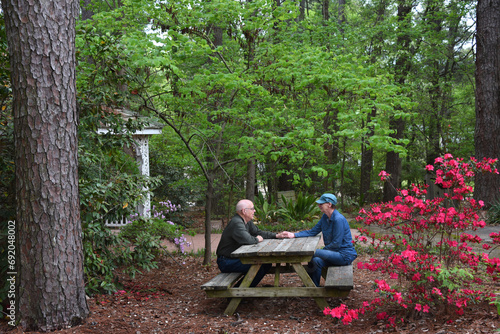 Couple Communicate During Arboretum Visit photo
