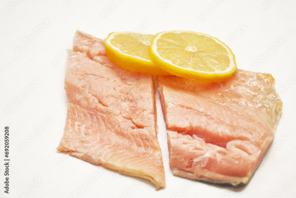 Fresh Lemon Slices on an Organic Salmon Steak Fresh Lemon Slices on an Organic Salmon Steak