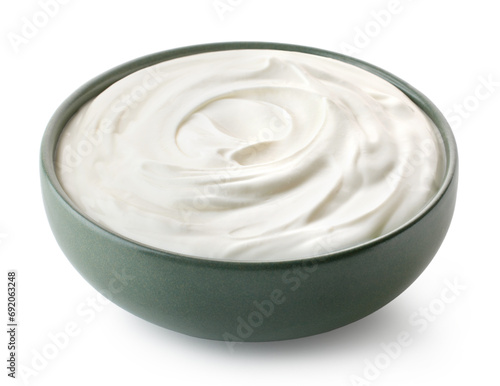 Green ceramic bowl of fresh greek yogurt or sour cream photo