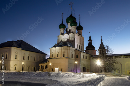 View of the courtyard of the Rostov Kremlin on a winter evening with the Gate Church of St. John the Theologian in the center. Rostov Veliky, Russia photo