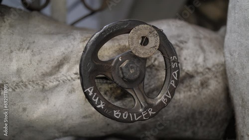 Hand wheel on steam bypass valve of auxiliary boiler photo