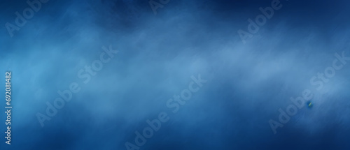 A serene blue sky peeks through a sea of billowy clouds  shrouding the outdoor landscape in a mystical fog