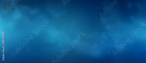 A serene scene of nature as the fog dances through the aqua blue sky, creating a blurred canvas for the majestic clouds to shine upon