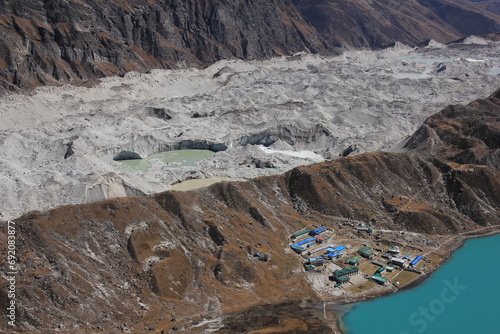 Lodges in Gokyo and detail of the Ngozumpa Glacier, Nepal. photo