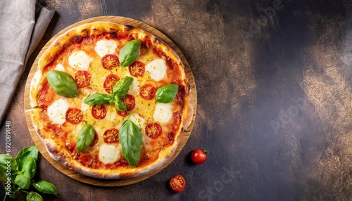 Italian pizza with mozzarella with fresh basil on wooden board. text space