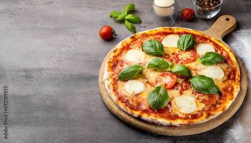 Margherita pizza garnished with fresh basil on wooden board, text space. 
