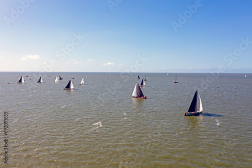 Aerial from skutsjesilen on the IJsselmeer in Friesland in the Netherlands photo