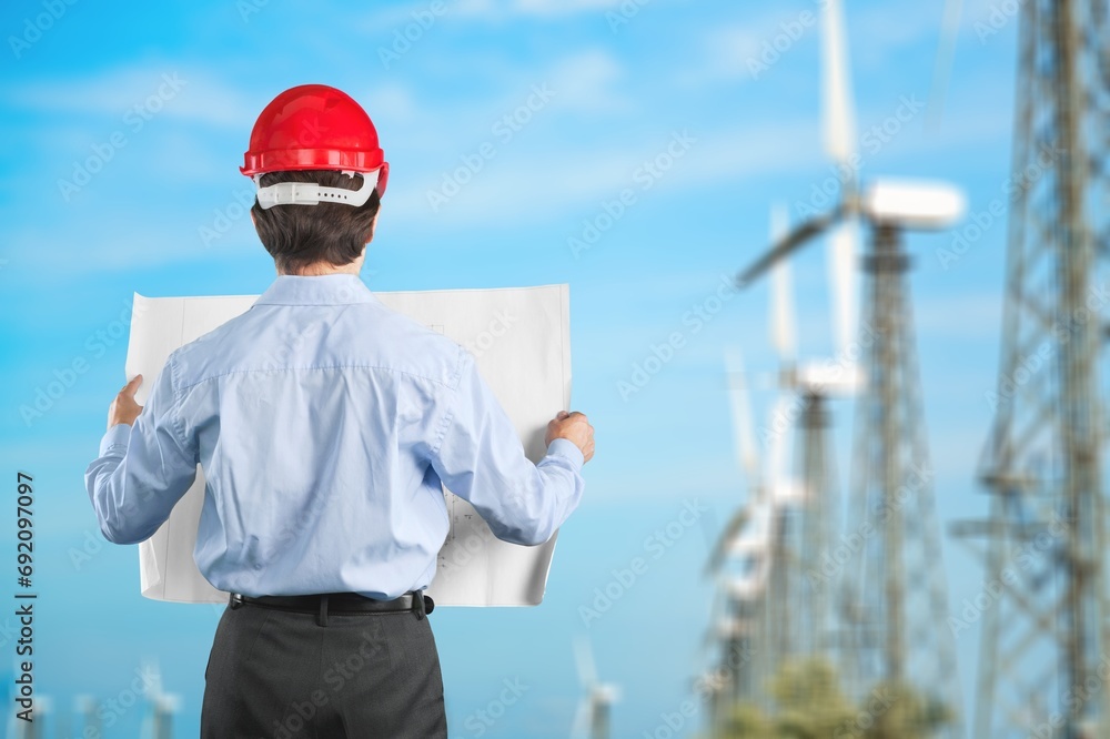 Engineer working with alternative eco energy resource Engineer working with alternative eco energy resource