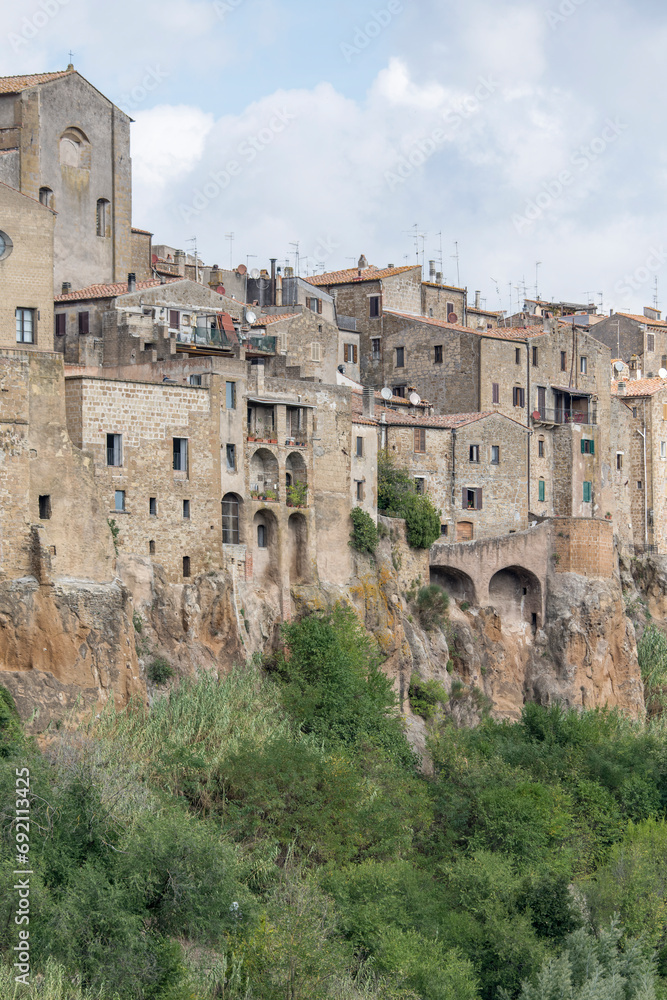 arches of medieval houses on cliffs, Pitigliano, Italy