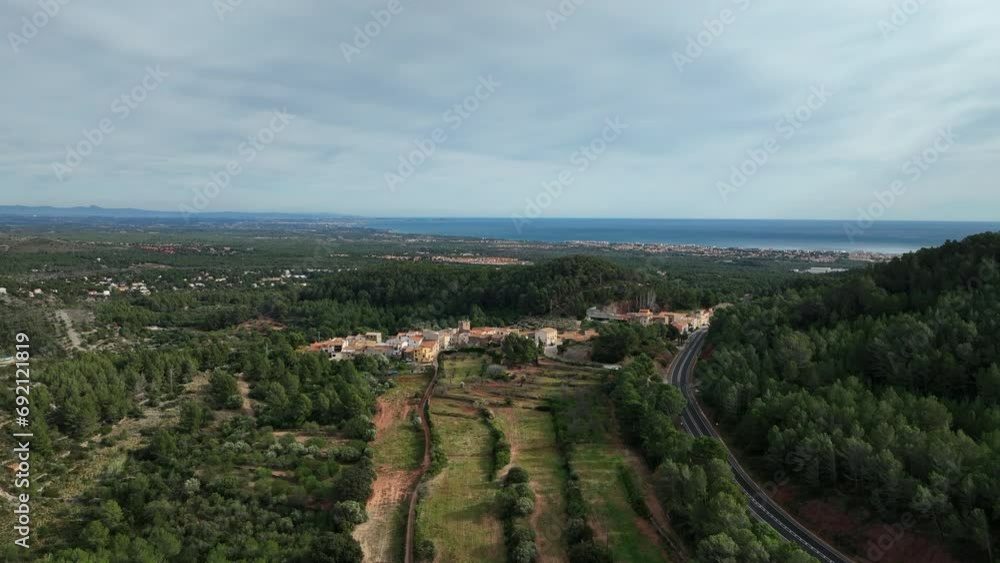 Aerial shot of old spanish town with sea views. Aerial shot of old spanish town with sea views.
