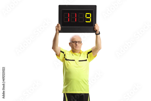 Photography Football referee holding a substitution board