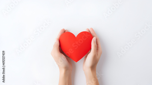 Red heart in hand on white . Valentine's day. Generated AI