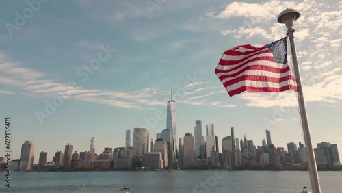 USA American flag. Memorial Day, Veteran's Day, July 4th. American Flag Waving near New York City, Manhattan view. 4th of July with American flags, Independence Day. American flags waving against NYC.