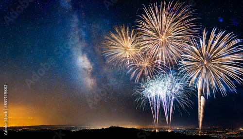 fireworks with blur milky way background © Emanuel