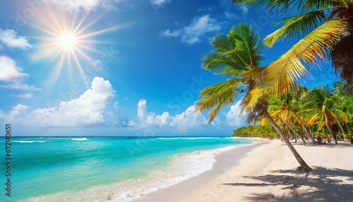 sunny tropical caribbean beach with palm trees and turquoise water caribbean island vacation hot summer day © Emanuel