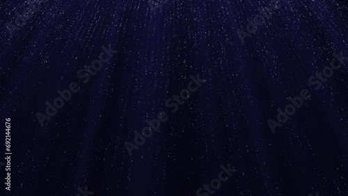 Dark blue abstract background with moving shiny blue particles up and down . Animated sparkling holiday background.