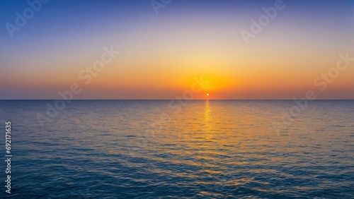 sunrise over the sea © Jun