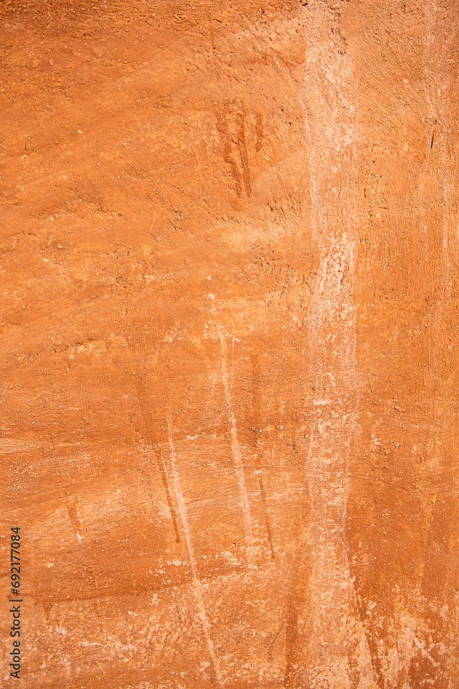 Slightly brownish orange striped and weathered antique wall texture