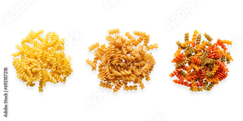 Variety of fusilli pasta on white background. Top view. Rectangular format. 