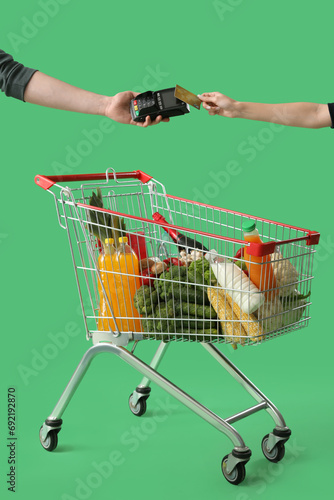 Woman paying for shopping c...