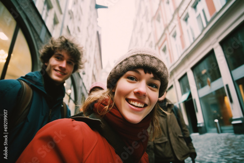Young tourists in a European city during a winter day © Magic Kiddo