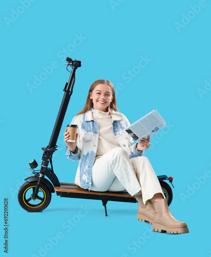 Young woman with coffee cup...
