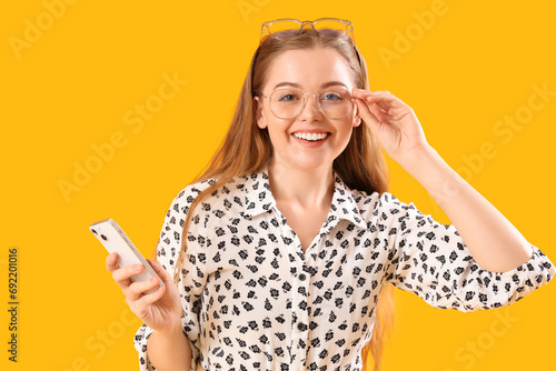 Young woman in eyeglasses w...