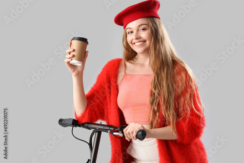 Stylish young woman with co...