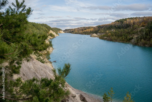 Beautiful landscape - a turquoise bright lake on the site of an old chalk quarry