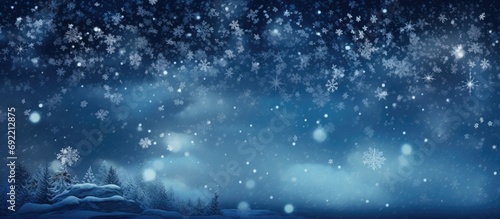 beautiful flying heavy snow on a black background of the night sky. Copy space image. Place for adding text or design