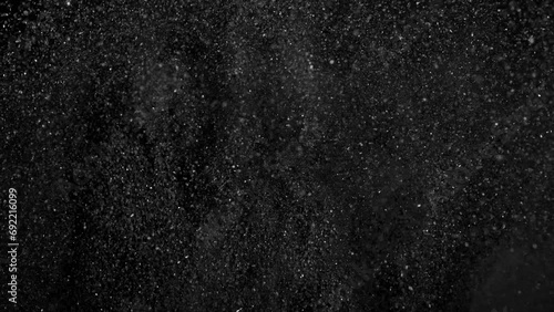 Super Slow Motion Shot of Abstract Glittering Coal Background at 1000fps. photo