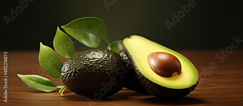Aguacate Criollo Home harvest of criollo avocado this variety is the ancestor of the domesticated varieties that we know today they are small with thin black skin and large seed. Copy space image photo