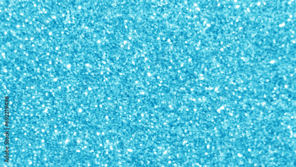 Blue glitter texture background.  Photo can be used for the concept of New Year, Christmas and all celebration background concepts. 