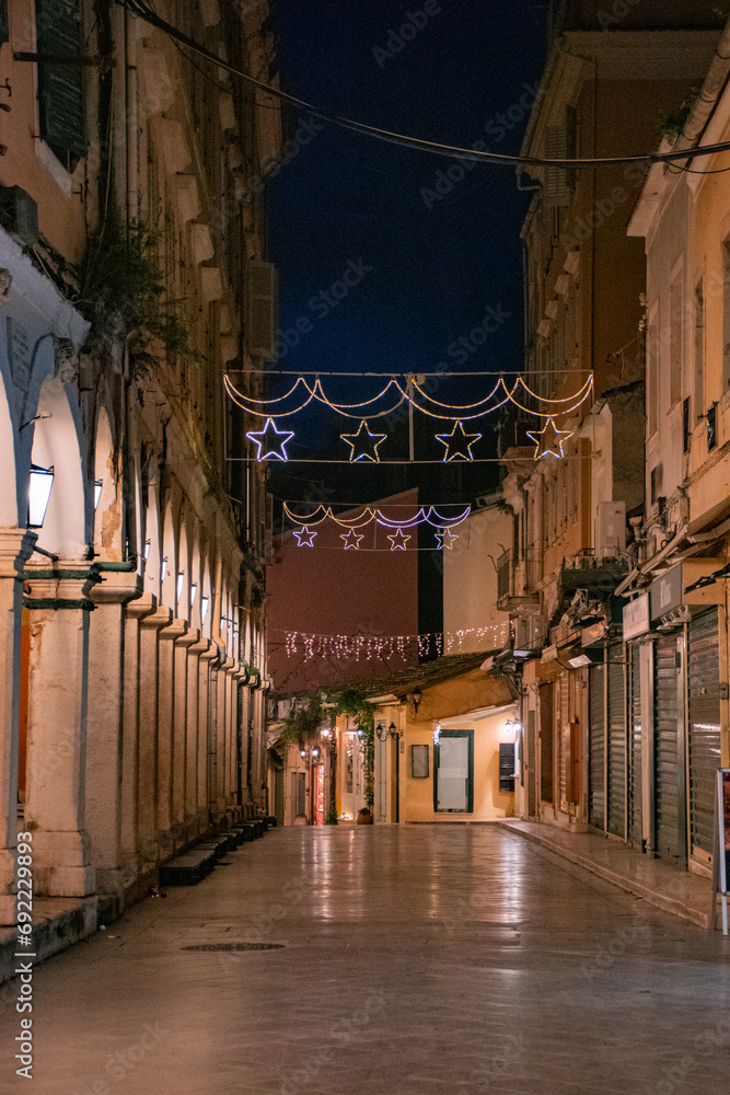 Christmas decorations on the streets of Corfu toen. Christmas in Greece. Festive evening in Greece